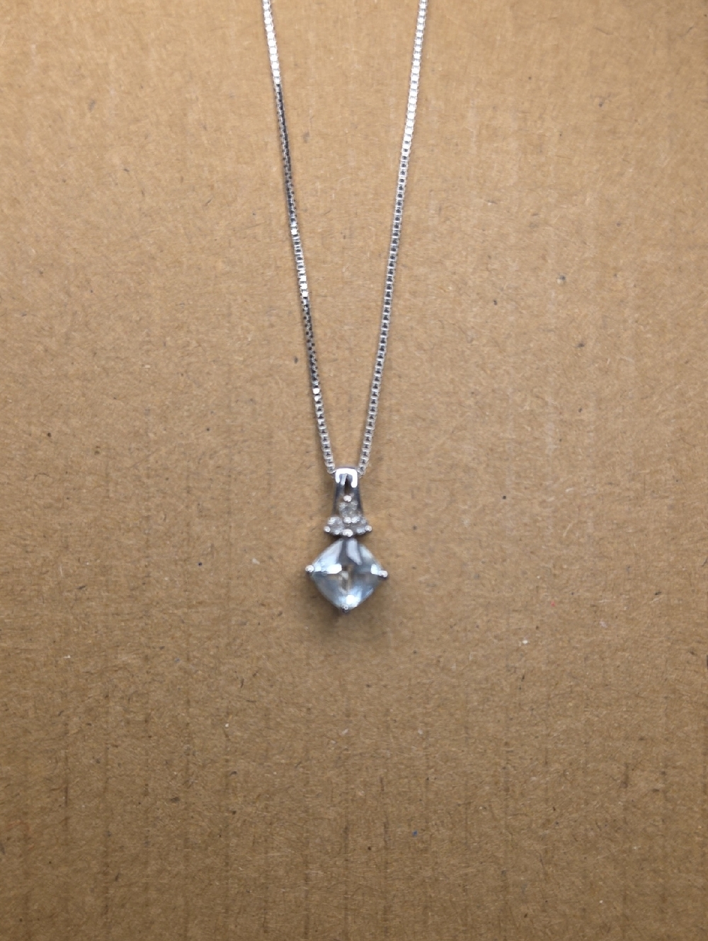 Sterling Silver Aquamarine Solitaire Pendant Necklace With Diamond Accent.